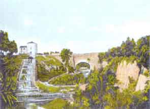 Fotograf�a antigua coloreada del puente del canal imperial tomada desde aguas abajo del r�o Huerva, en la que se puede apreciar la almenara y su escalonado aliviadero.